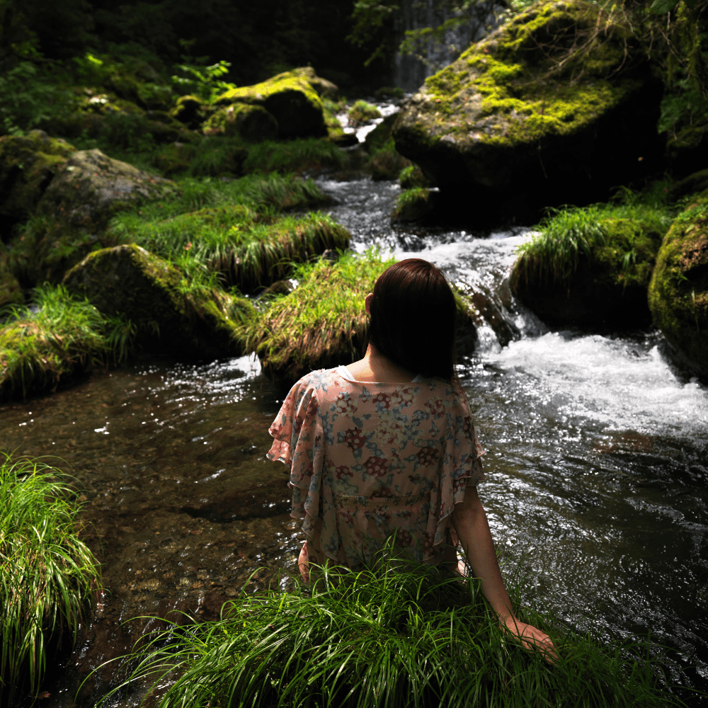 Eco therapist a person happy in nature after working with an eco therapist