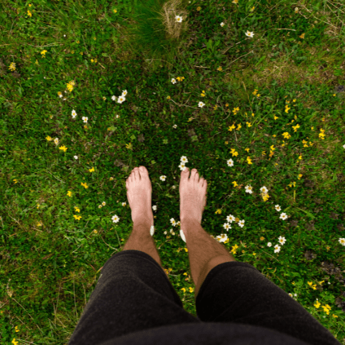 feet in grass